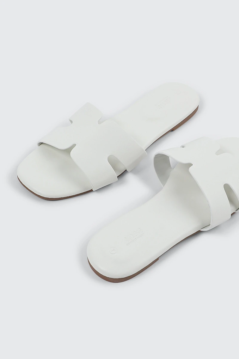 Sandales plates à bride en H