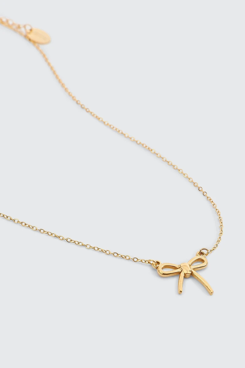 Ardene Stainless Steel Bow Necklace in Gold