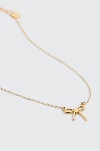 Ardene Stainless Steel Bow Necklace in Gold