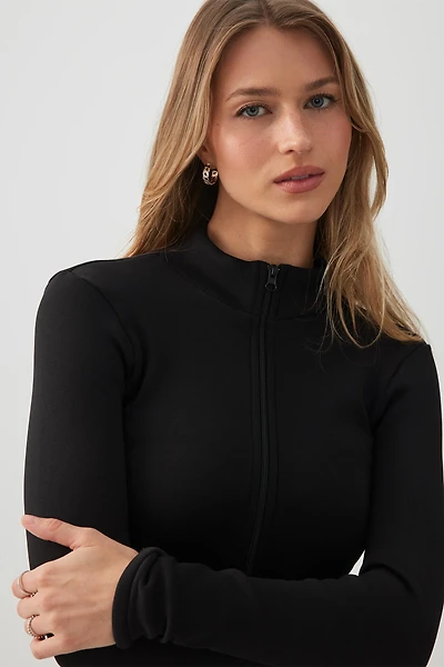 Haut à glissière doublé en fausse fourrure