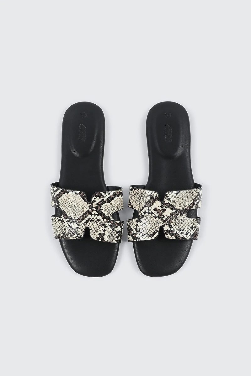 Sandales plates à bride en H