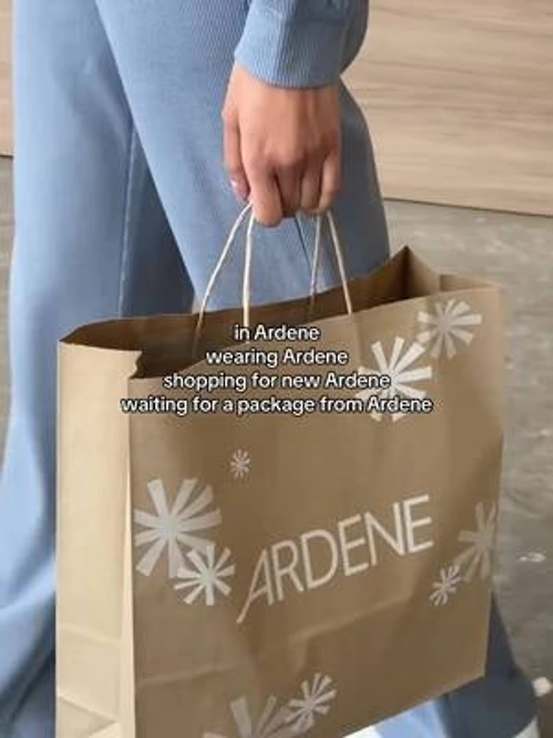 Veste à capuchon et glissière en tricot gaufré