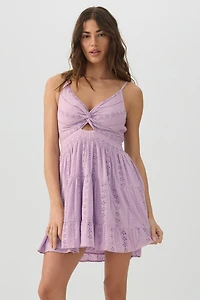 Robe mini torsadée à œillets