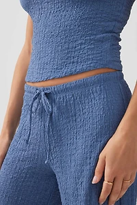 Pantalon fluide en tissu texturé