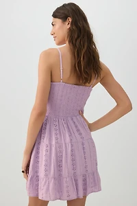 Robe mini torsadée à œillets