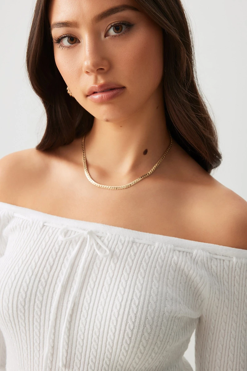 Chandail à épaules dénudées en tricot torsad