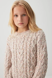 Chandail en tricot torsadé