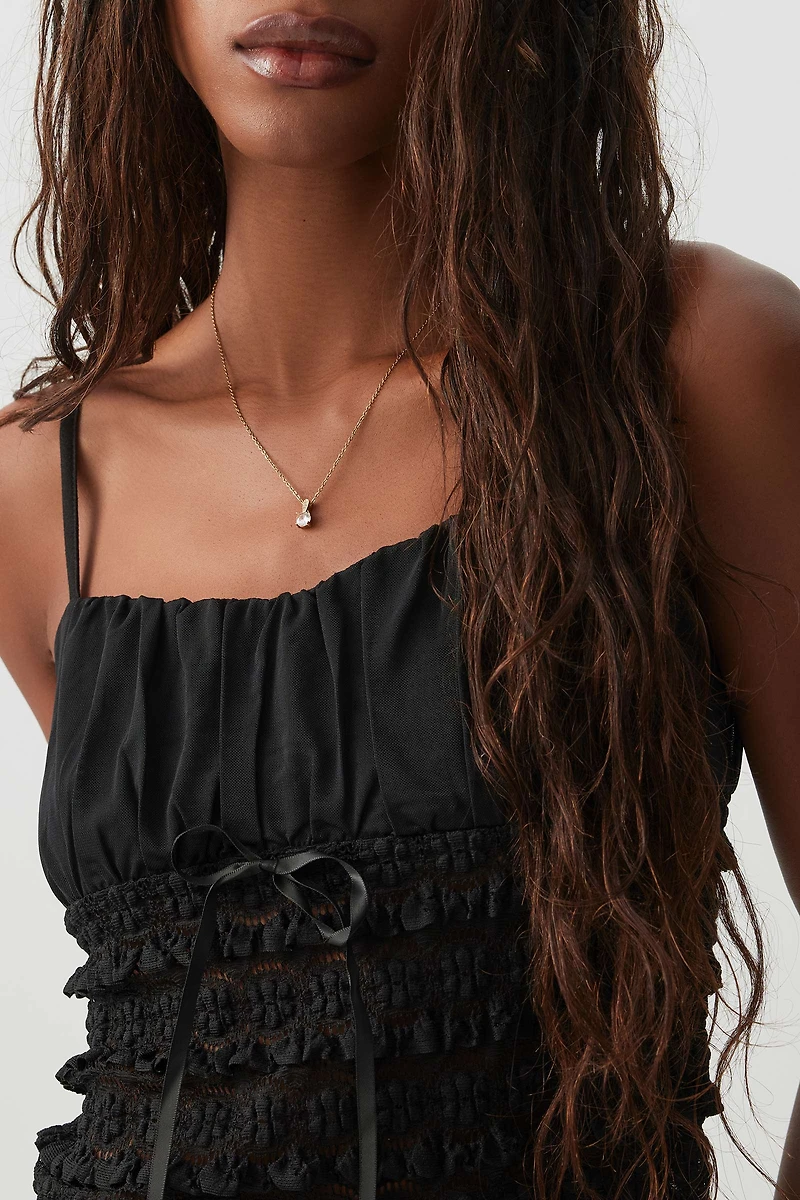 Camisole en dentelle à buste froncé