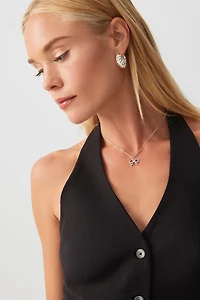 Veste licou sans manches à dos ouvert