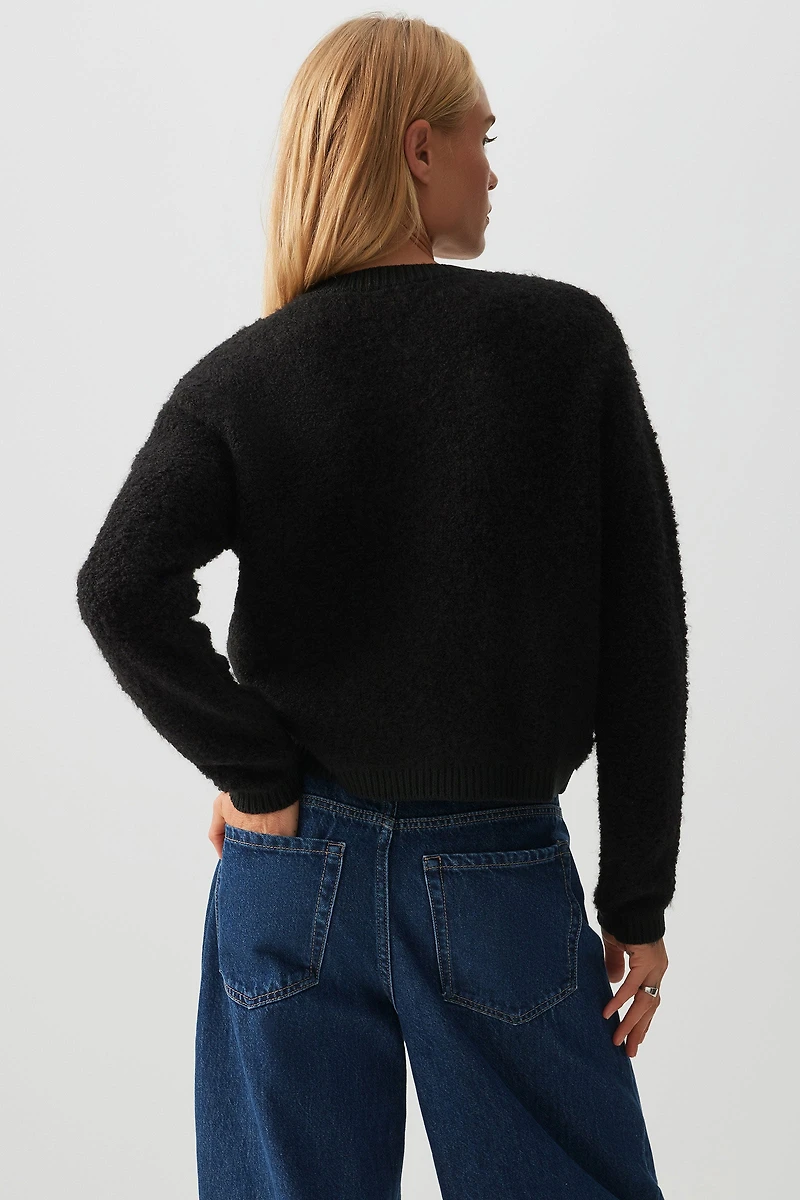 Cardigan court en tricot bouclé