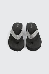 Sandales compensées à bride V ornée