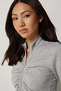 Chandail à col montant froncé glissière