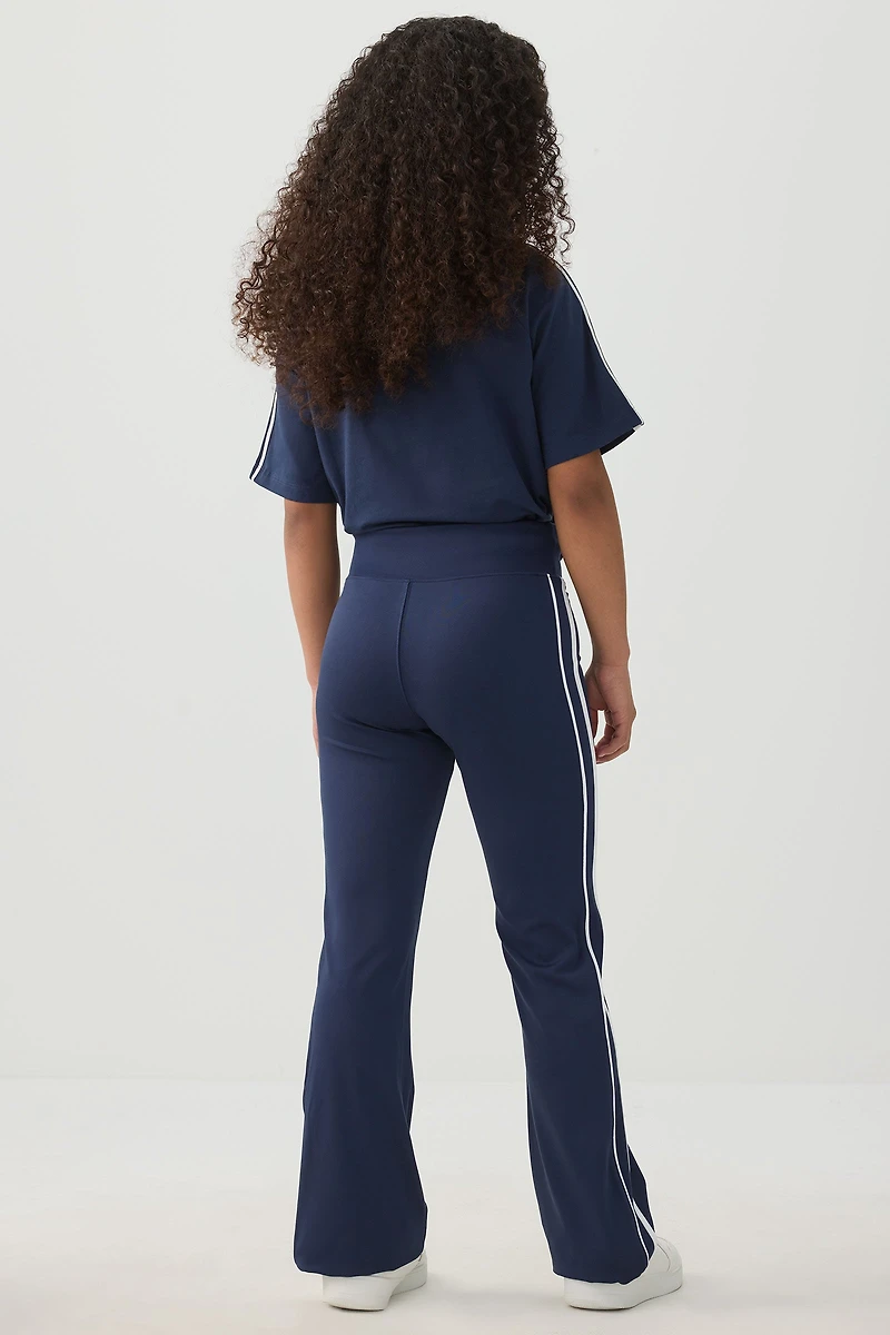 Pantalon évasé à rayures latérales