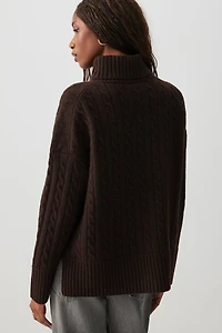 Chandail à col roulé en tricot torsadé