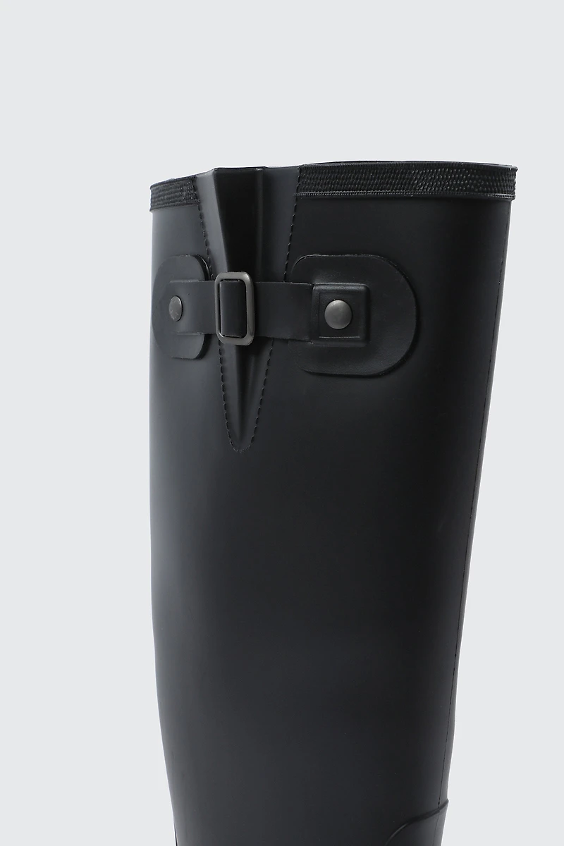 Bottes de pluie aux genoux