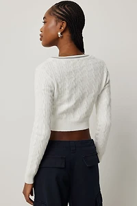 Chandail court en tricot torsadé