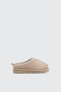 Sabots en faux mouton à bordure accent