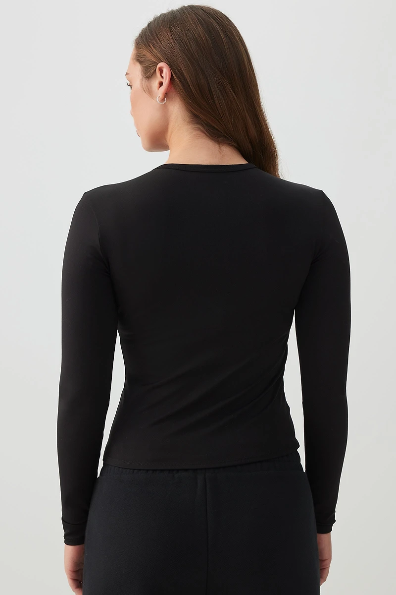 Haut ajusté à manches longues