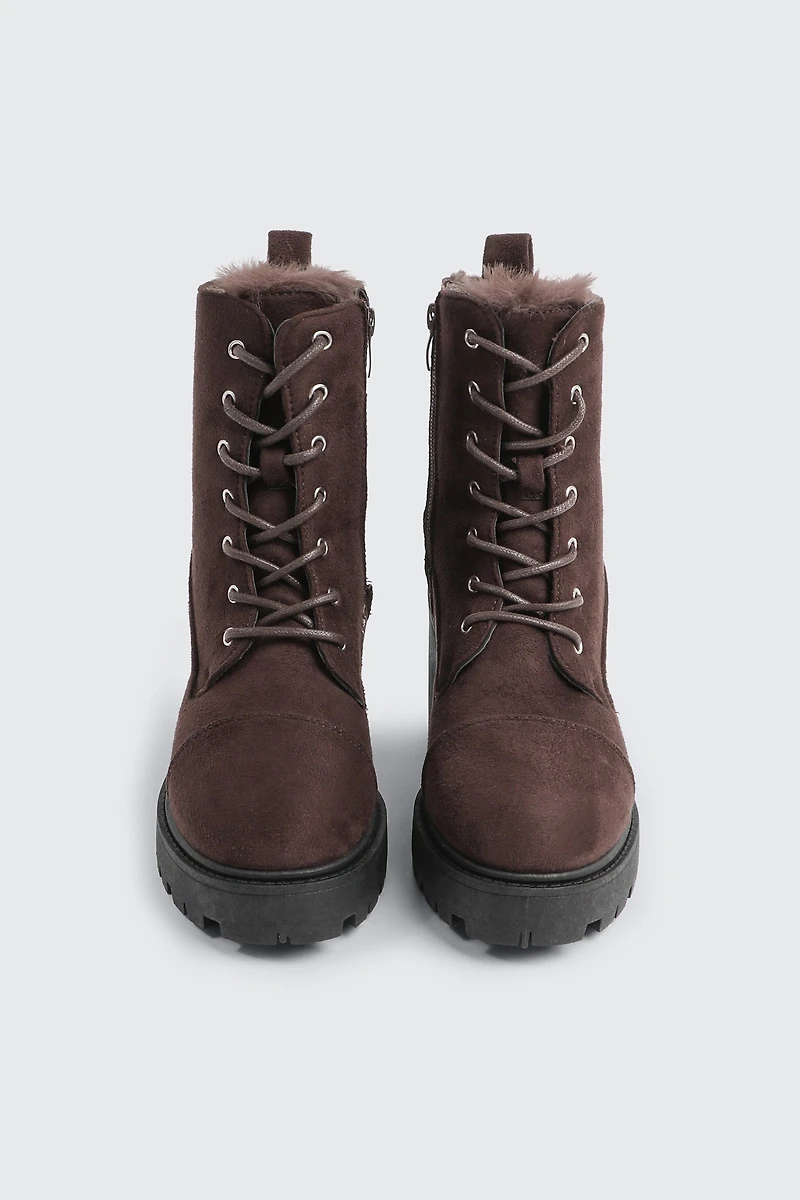 Bottes lacées doublées en fausse fourrure