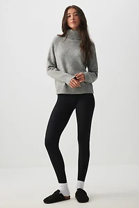 Chandail à col roulé en tricot pelucheux