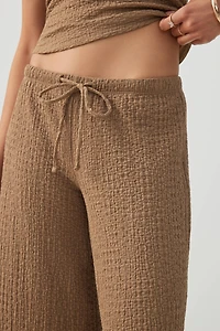 Pantalon fluide en tissu texturé