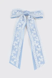 Barrette boucle à broderies