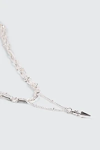 Collier deux rangs à pendentif pique