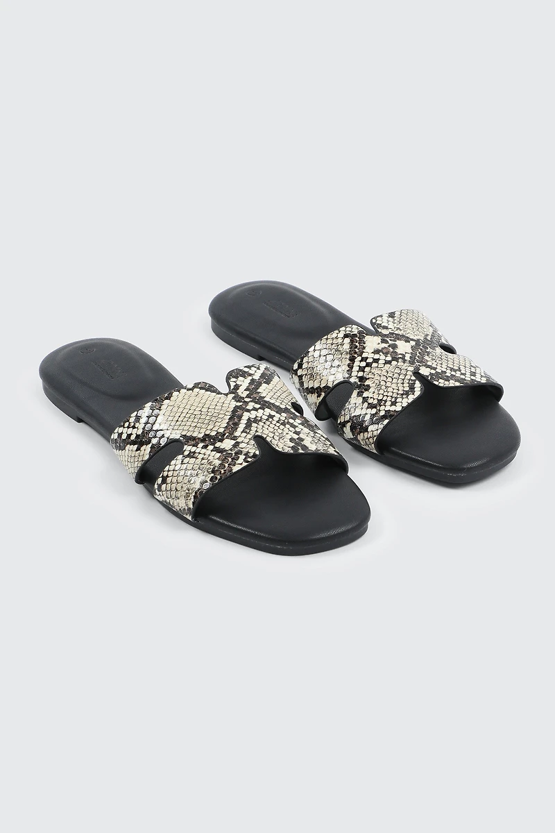 Sandales plates à bride en H