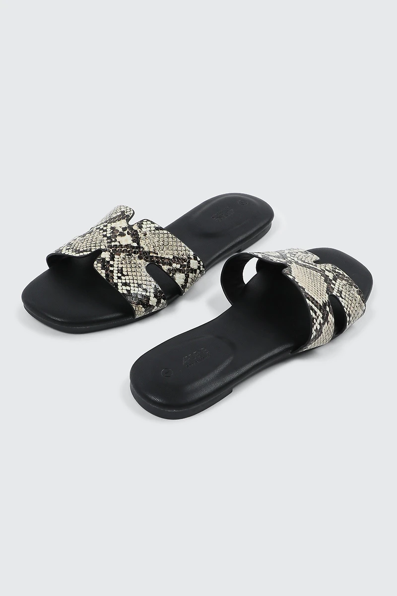 Sandales plates à bride en H