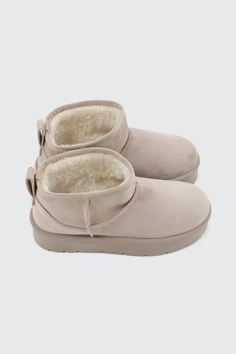 Bottes plateformes mini en faux mouton