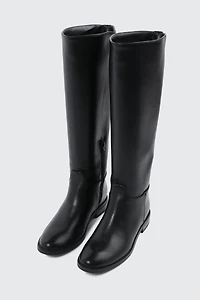 Bottes aux genoux en faux cuir