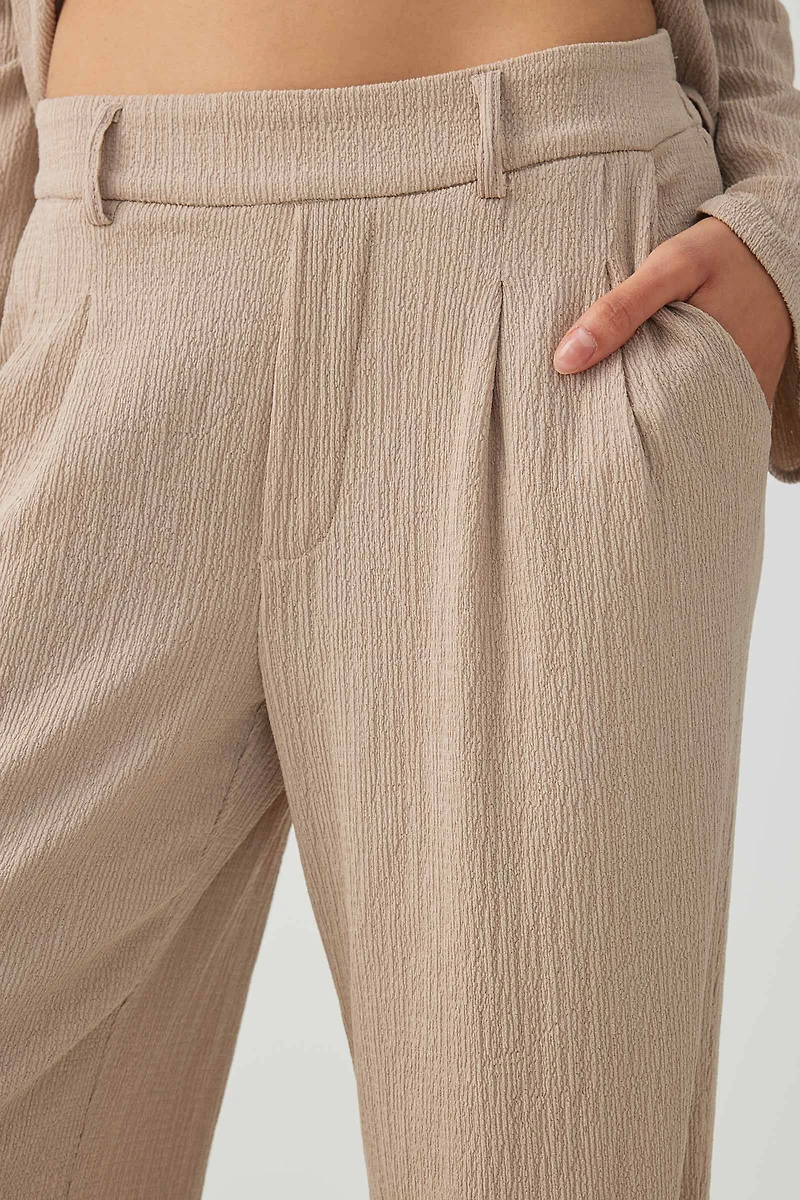 Pantalon plissé à taille élastique en tissu gaufr