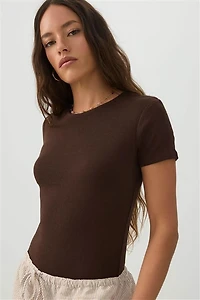 Justaucorps côtelé fin à encolure ronde