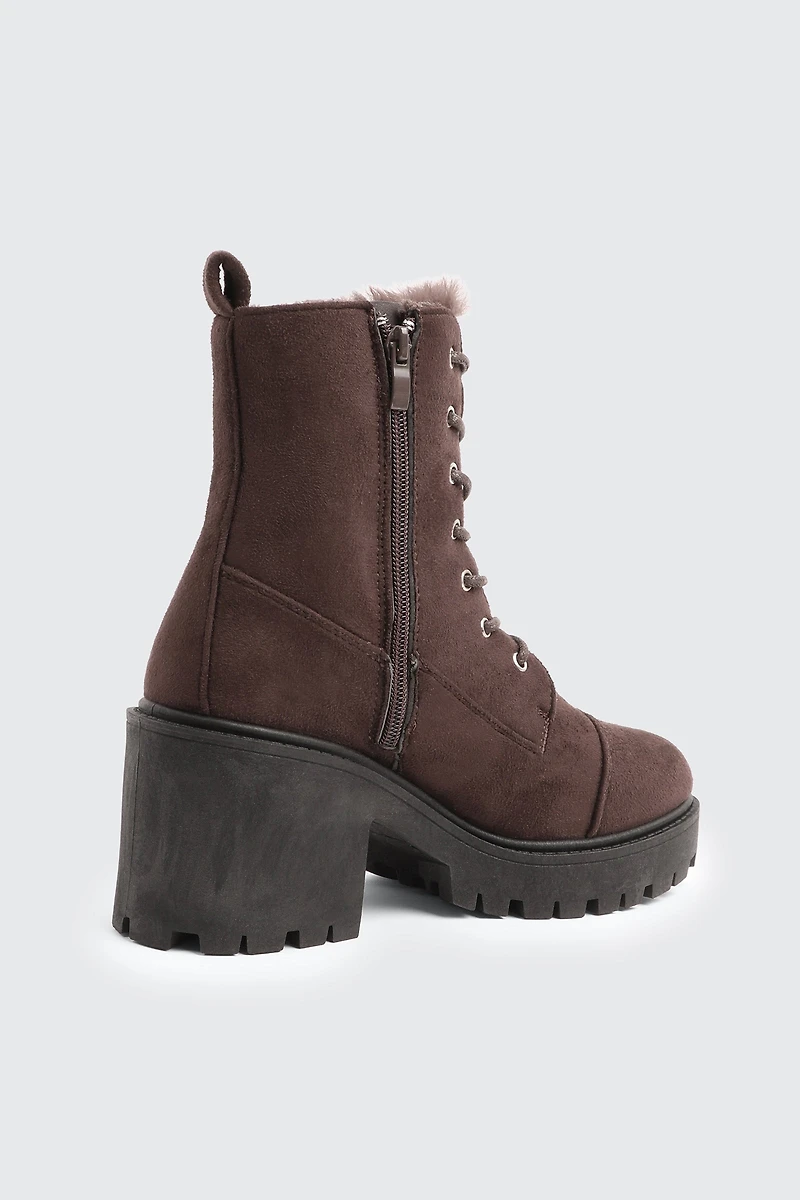 Bottes lacées doublées en fausse fourrure