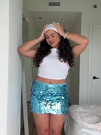 Jupe courte en maille filet doublé fleuri