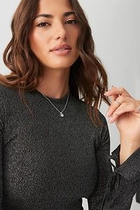 Haut à manches nouées