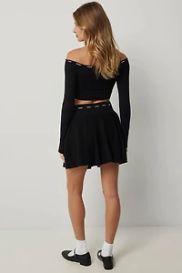 Jupe courte évasée à cordon contrastant