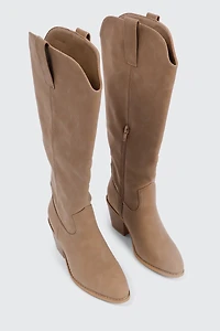 Bottes de cowboy aux genoux