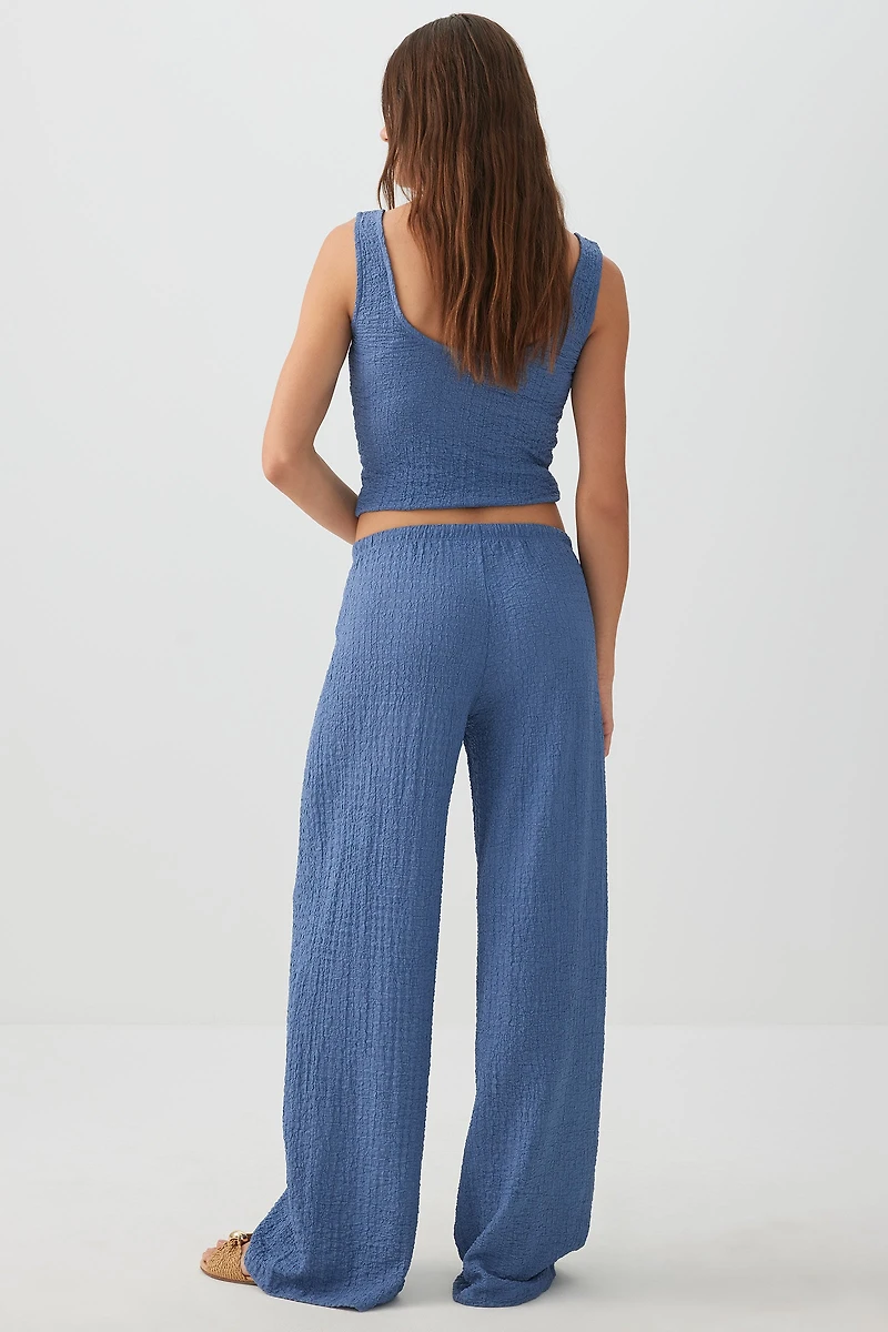 Pantalon fluide en tissu texturé