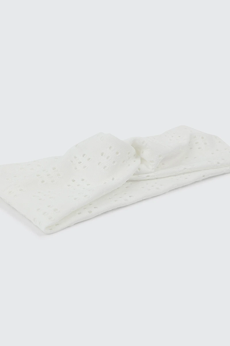 Bandeau torsadé à broderie anglaise