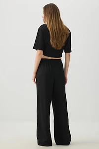 Pantalon à jambe large en tissu texturé