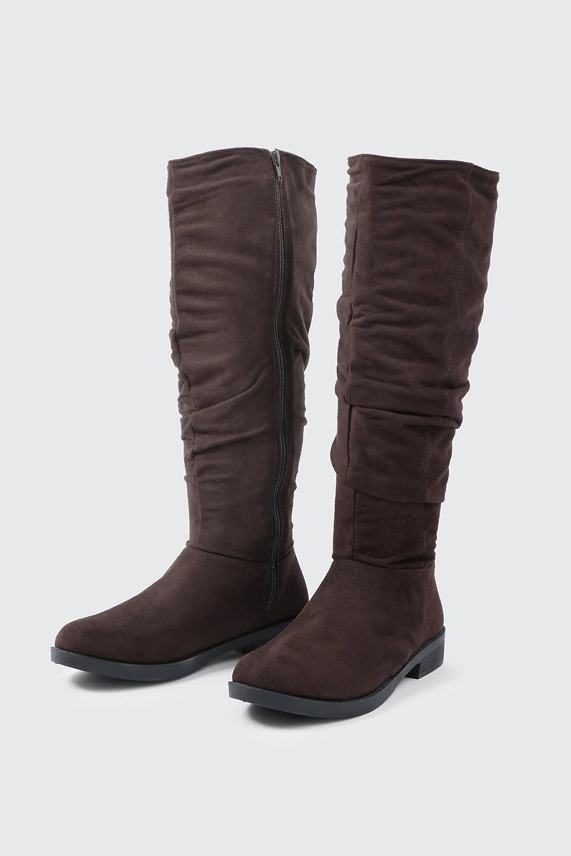Bottes aux genoux ruchées à bout rond