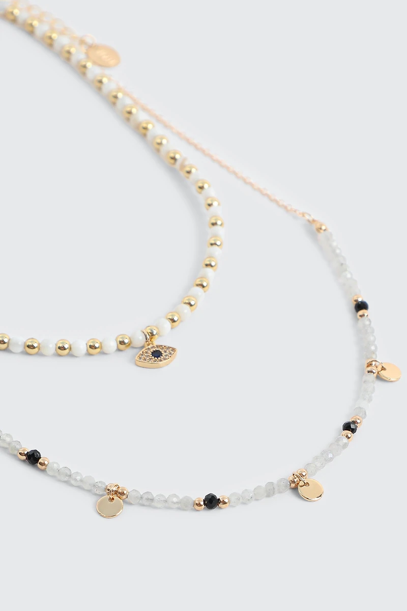 Collier deux rangs à pendentif œil
