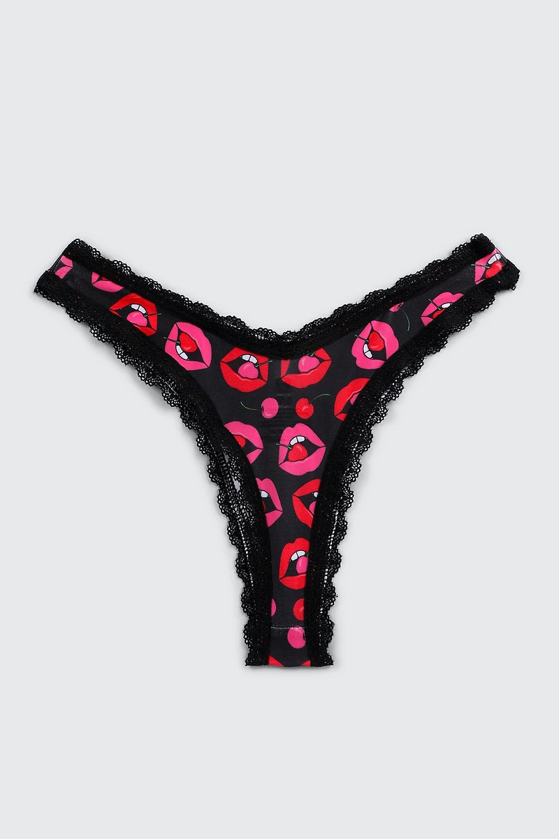 Culotte tanga imprimée dans une boîte