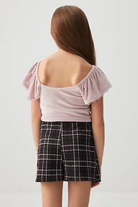 Jupe-short à carreaux et détail de boucles