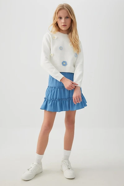 Jupe courte étagée en tissu texturé