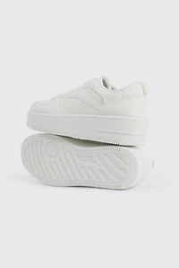 Espadrilles à semelle épaisse et breloque