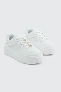 Espadrilles plateformes à détail de breloque