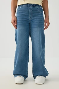 Jean à jambe large enfiler