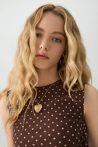 Haut court à col rond et fronces latérales